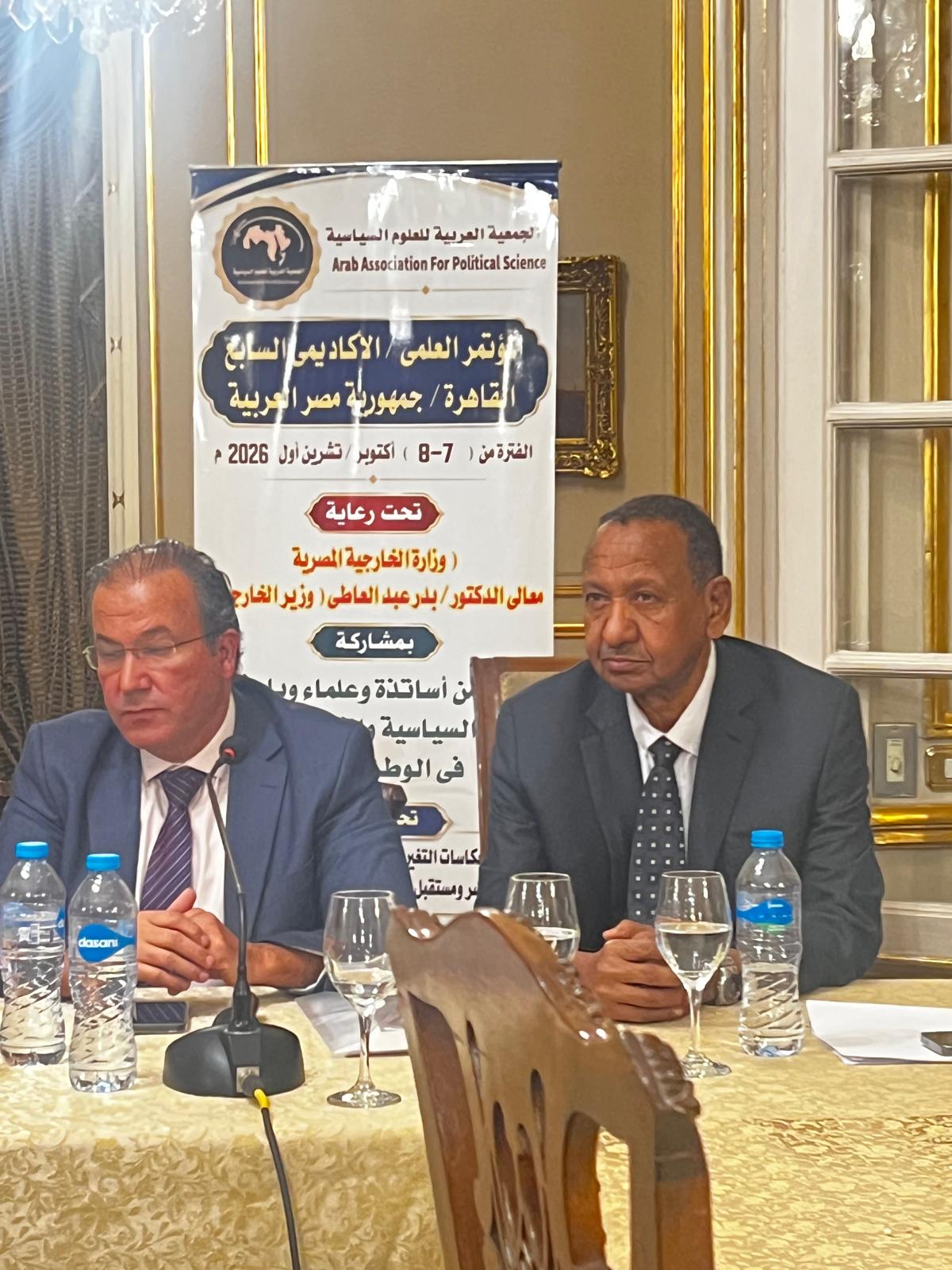 Dr. Mustafa Osman Ismail with Dr. Hassan Al-Ash'ar, Secretary-General of the Arab Association of Political Science, in a dialogue session.
